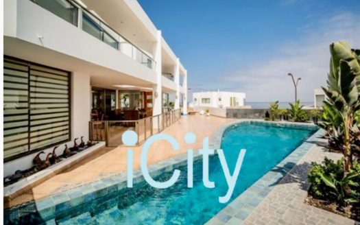 UF 28.000 ESPECTACULAR CASA EN LOTEO PARADOR EN SOL IQUIQUE