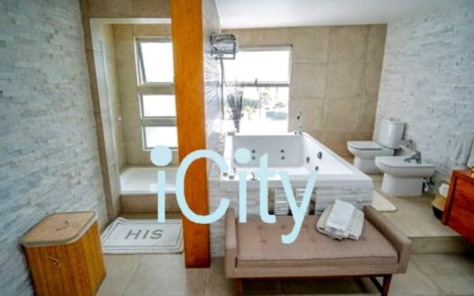 UF 28.000 ESPECTACULAR CASA EN LOTEO PARADOR EN SOL IQUIQUE